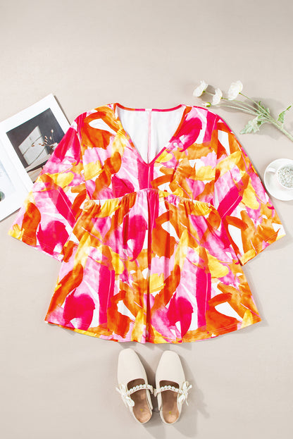 Oranje babydollblouse met abstracte print, 3/4 mouwen en V-hals met ruches