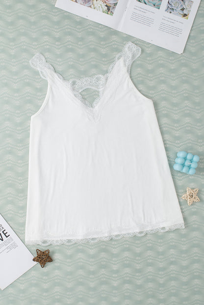 Witte uitlopende tanktop met delicate kanten rand