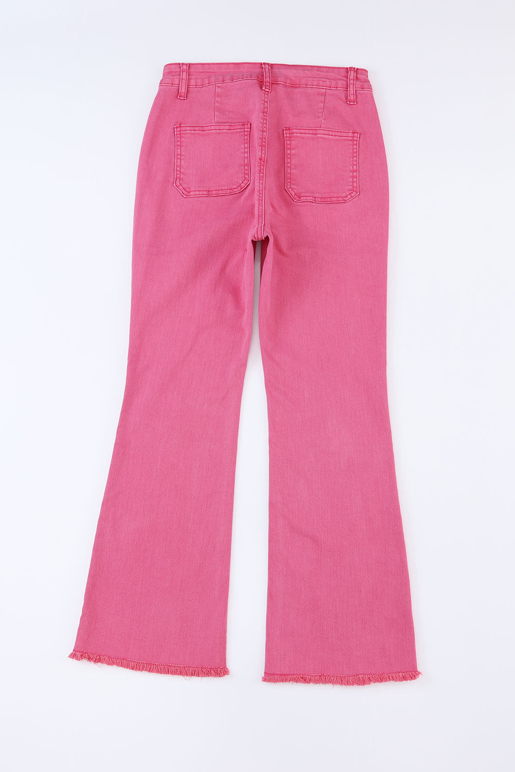 Roze enkellange jeans met uitlopende pijpen en ruwe zoom