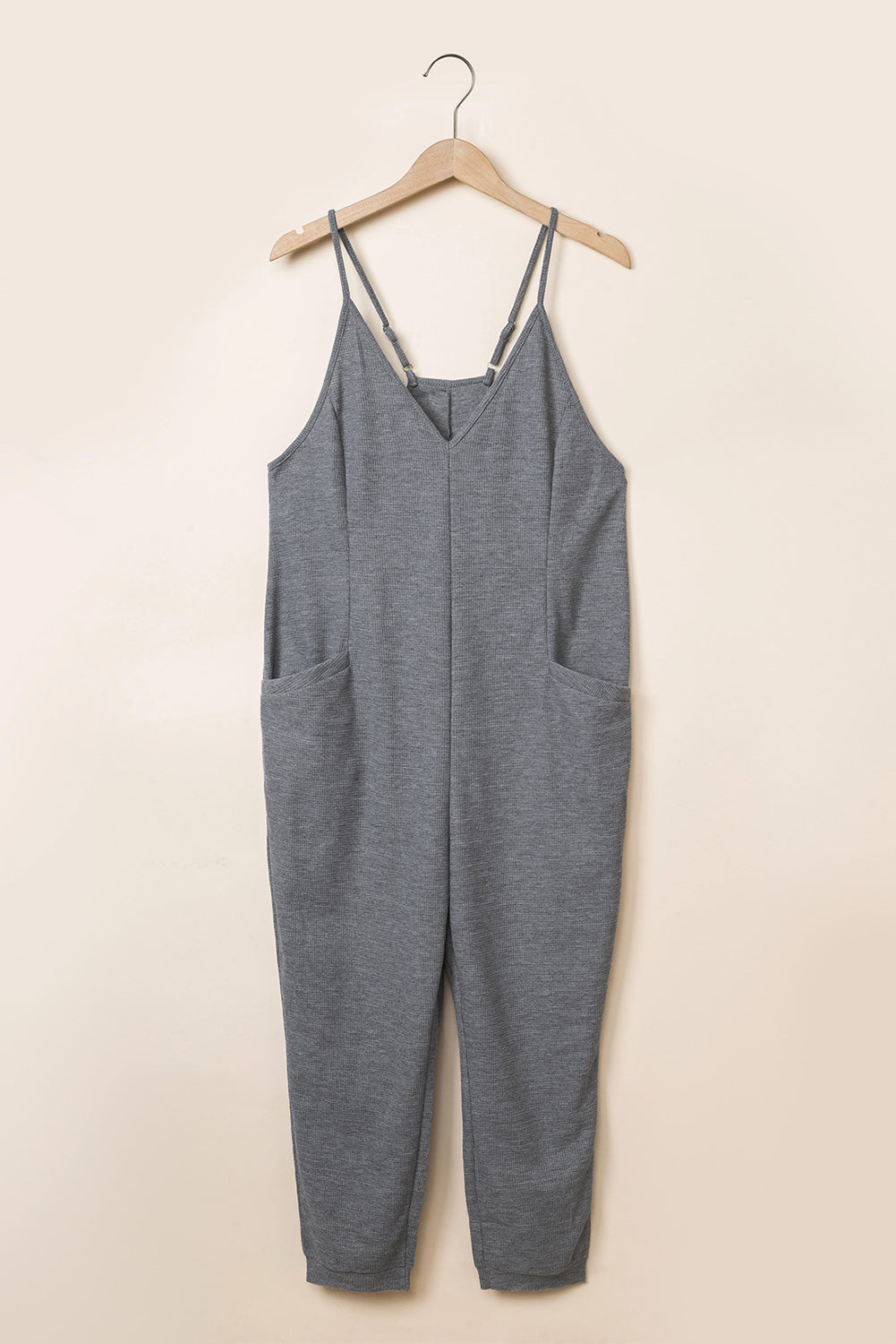 Grijze getextureerde mouwloze casual jumpsuit met V-hals en zakken