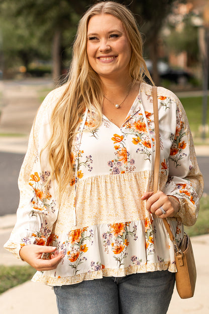 Witte plus-size blouse met bloemenprint, V-hals en pofmouwen