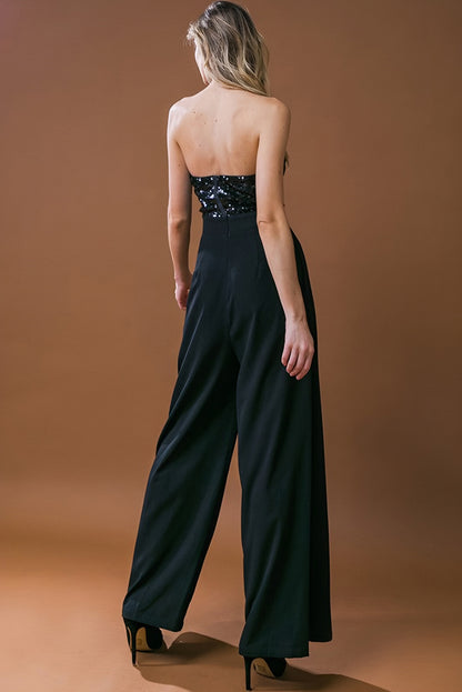 Zwarte jumpsuit met pailletten en wijde pijpen