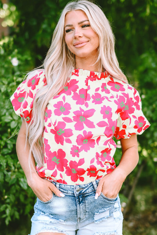 Beige blouse met bloemenpofmouwen en ruches aan de halslijn