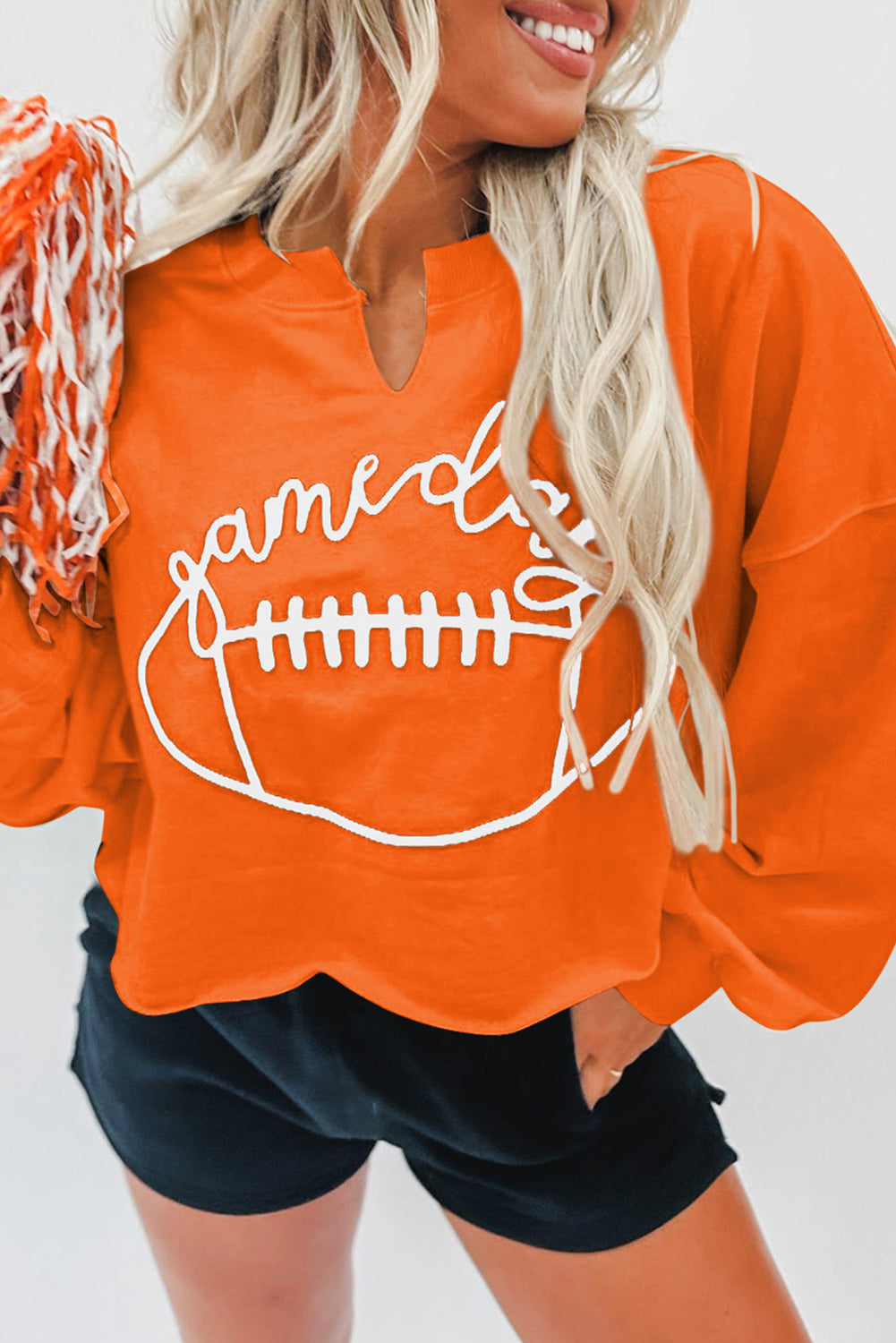 Oranje Game Day-sweatshirt met rugbyvoetbal en ingekerfde hals