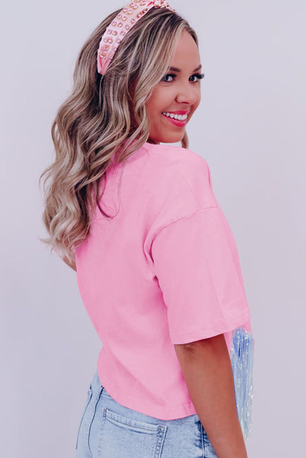 Roze cropped T-shirt met pailletten en franjes