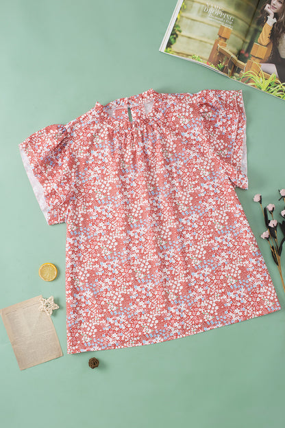 Roze grote maat blouse met bloemenprint, ruches aan de mouwen en ruches aan de hals