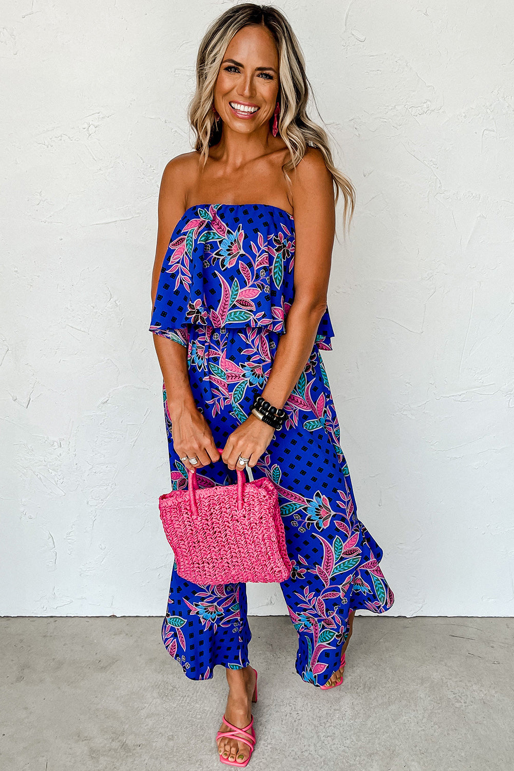 Blauwmix strapless jumpsuit met ruches en tropische print