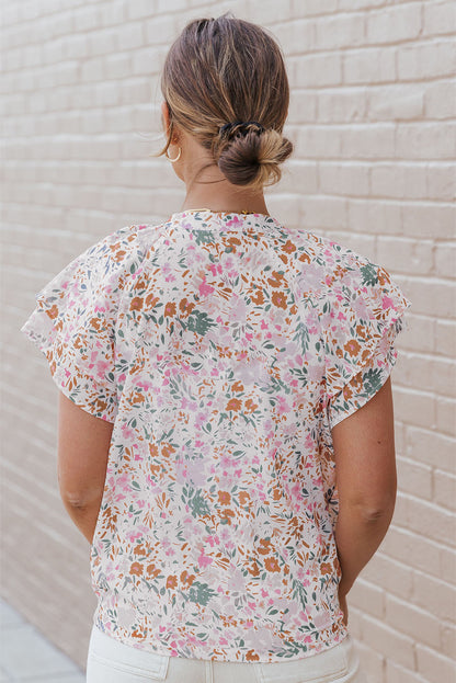 Top met veelkleurige bloemen en mandarijnkraag