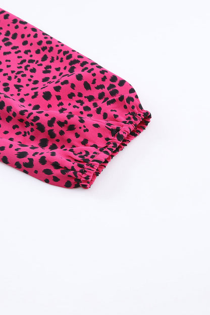 Geplooide blouse met roze luipaardprint en sleutelgat