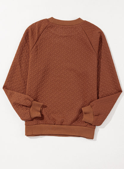 Kastanjekleurig sweatshirt met effen textuur en raglanmouwen