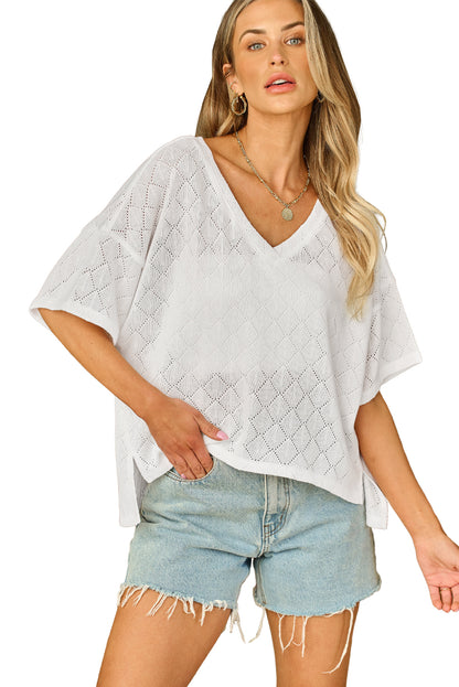 Witte v-hals gebreide flowy blouse