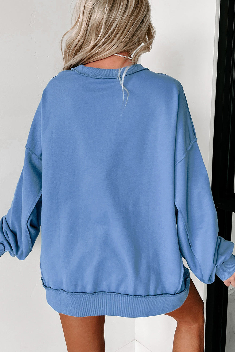 Sweatshirt met geborduurde ster in hemelsblauw paillettenpatroon in de VS