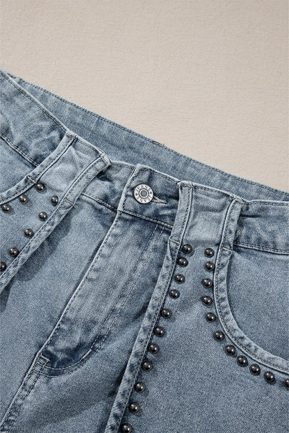 Schemerblauwe jeansshort met studs in zure wassing