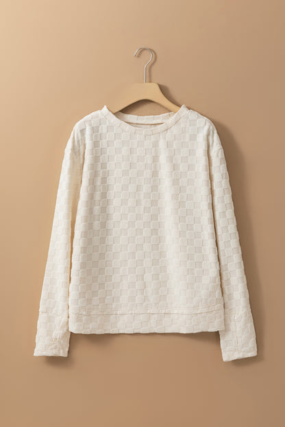 Beige effen getextureerde top met duimgaten