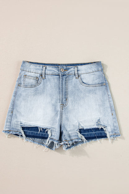 Lichtblauwe vintage gewassen jeansshort met ruwe rand