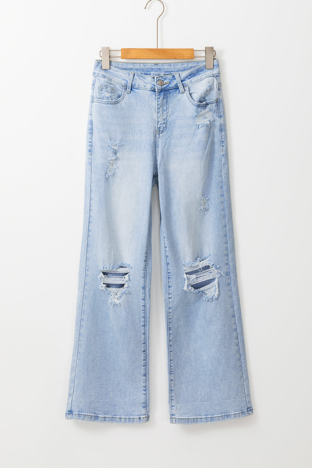 Beau blauwe vintage lichte wassing van verontruste flare-jeans