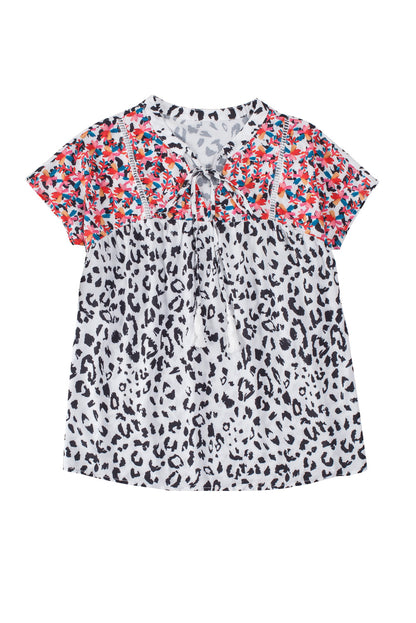 Blouse met luipaardmix en kwastjes