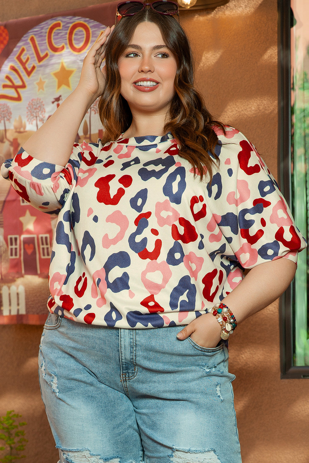 Witte kleurrijke blouse met vleermuismouwen en luipaardprint