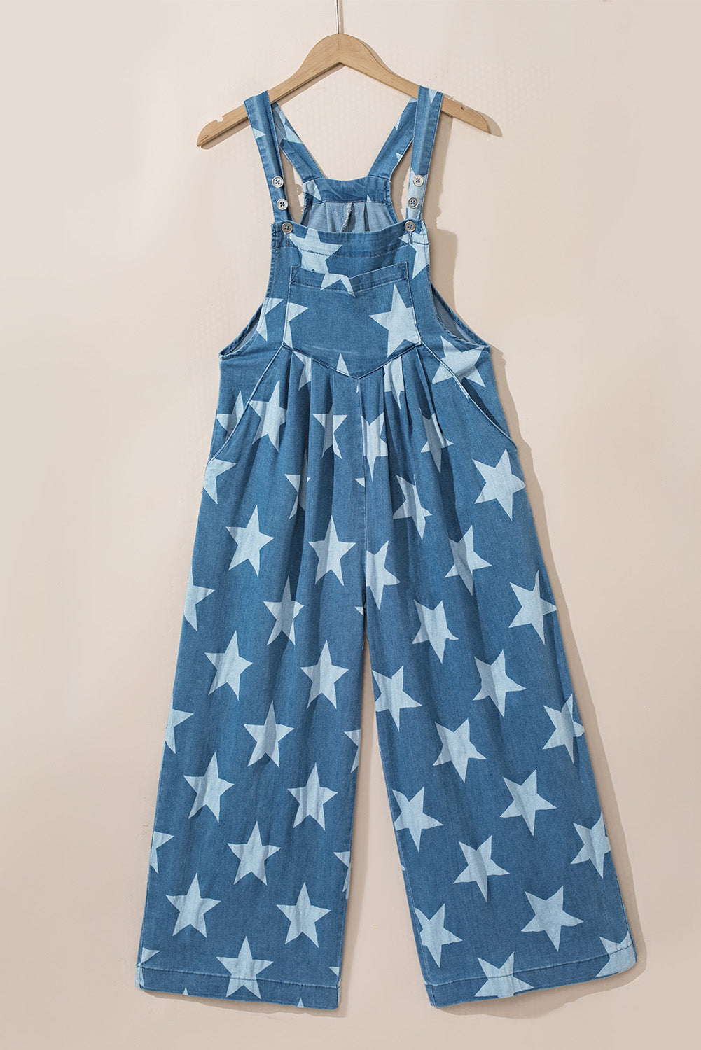 Denim overall met sterrenprint en bandplooi met wijde pijpen en knoopsluiting