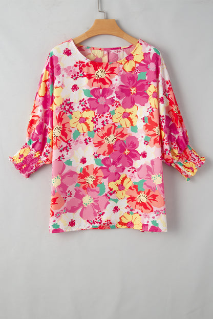 Roze gesmokte manchetten en bloemenblouse met 3/4 mouwen