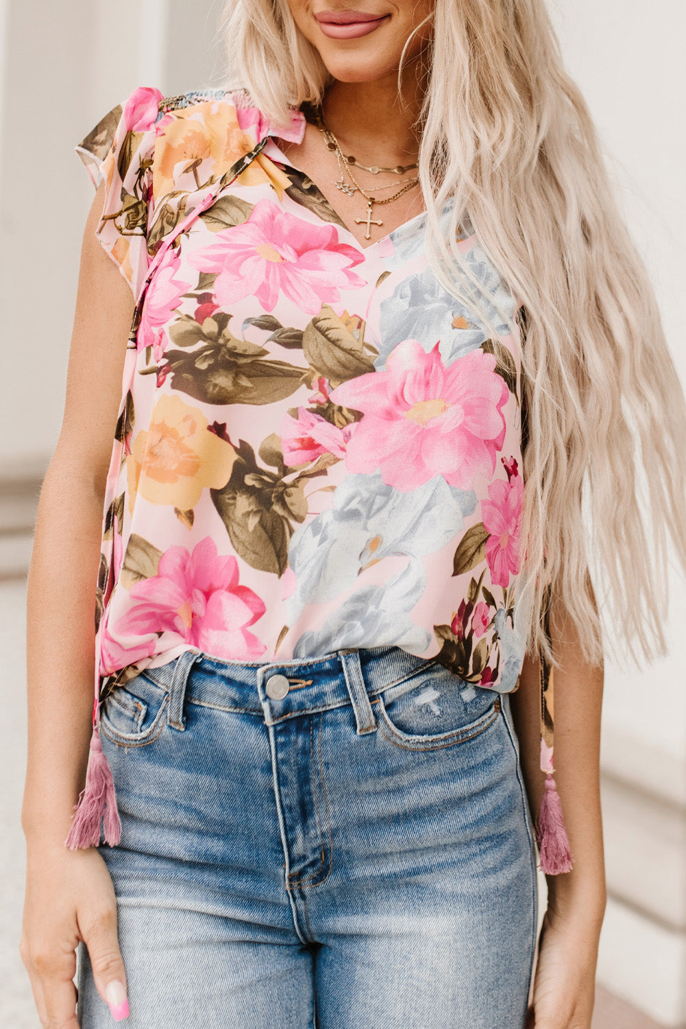 Roze bloemenprint blouse met kwastje en korte mouwen