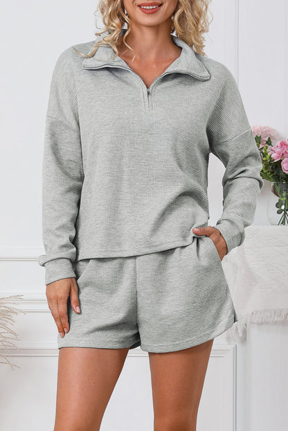 Set van grijs geribbeld sweatshirt met rits en short met hoge taille