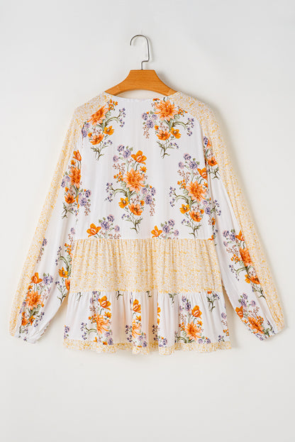 Witte plus-size blouse met bloemenprint, V-hals en pofmouwen