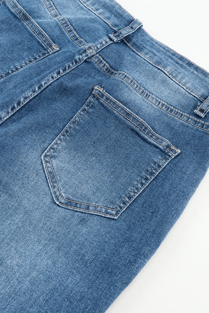 Blauwe zakflare-jeans met hoge taille en stiksels