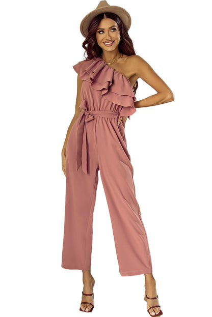 Stoffig roze jumpsuit met één schouder en ruches en riem