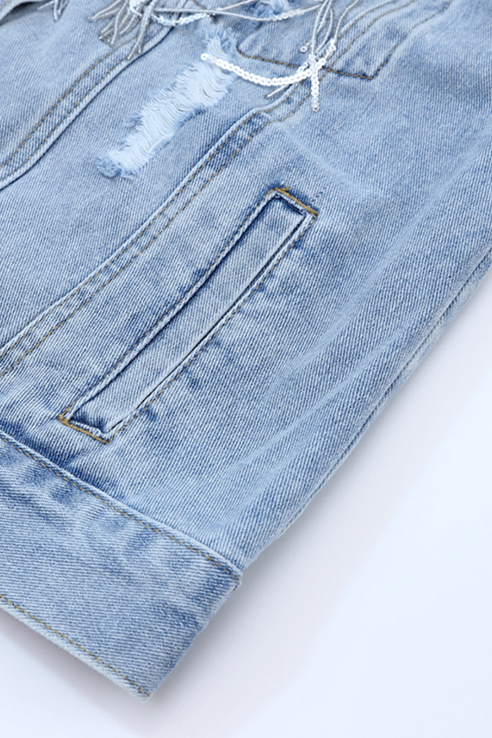 Hemelsblauw, met pailletten verfraaid denim jack met franjes