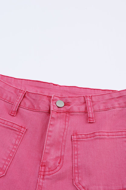 Roze enkellange jeans met uitlopende pijpen en ruwe zoom