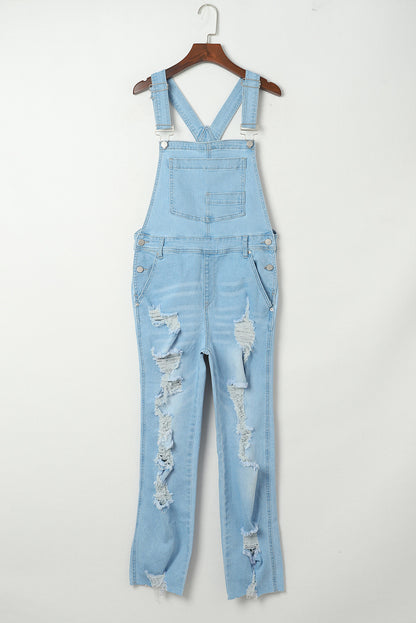 Hemelsblauw geconstrueerde noodlijdende denim overall met borstzak