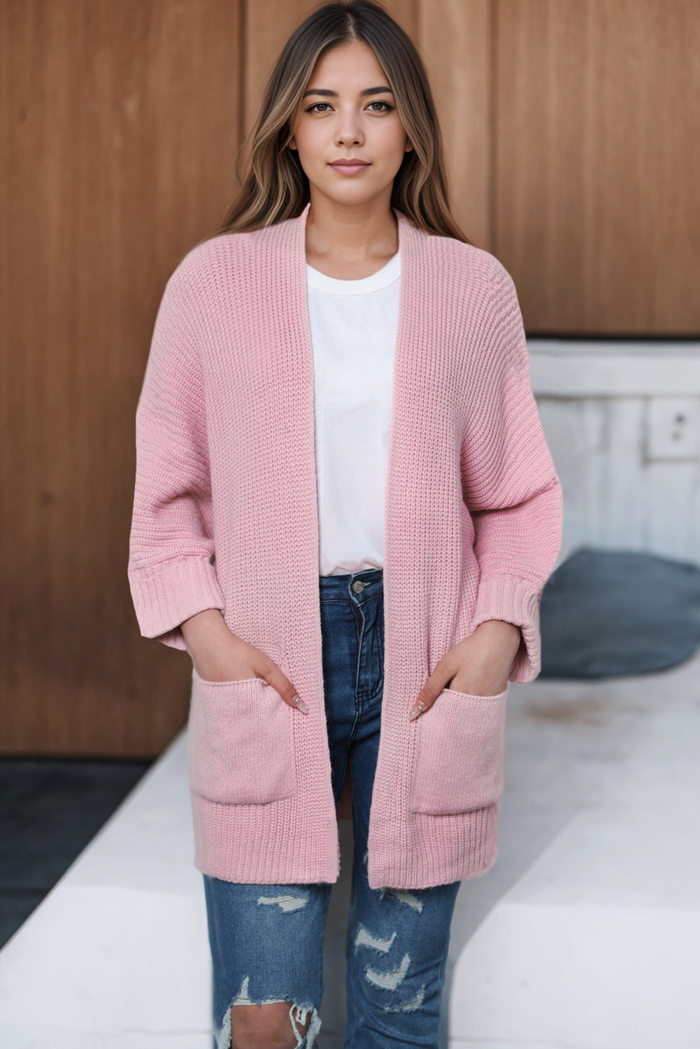 Roze oversized truivest met omslagmouwen