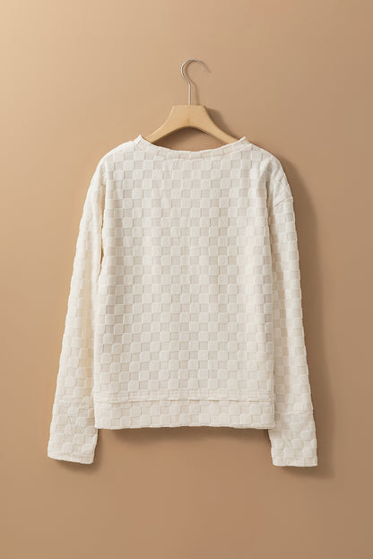 Beige effen getextureerde top met duimgaten