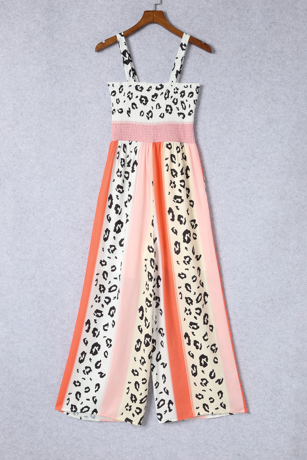 Roze jumpsuit met zakken en print in luipaardkleurenblokken