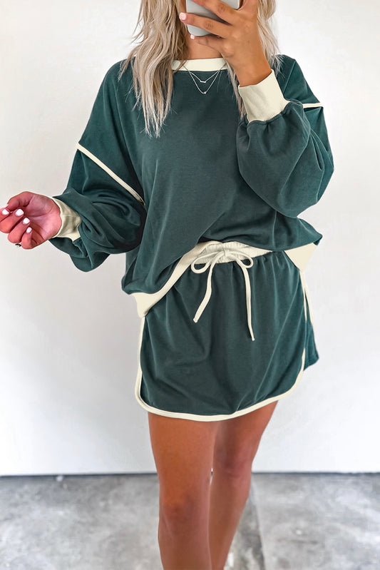 Groenblijvende kleurcontrast losse pullover en veter taille skort set