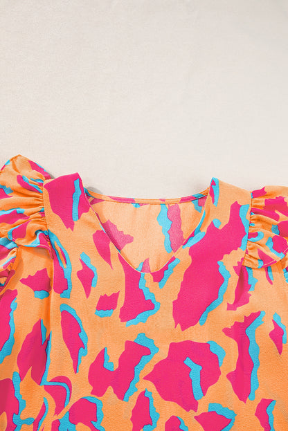 Oranje blouse met abstracte print, V-hals en ruches aan de mouwen