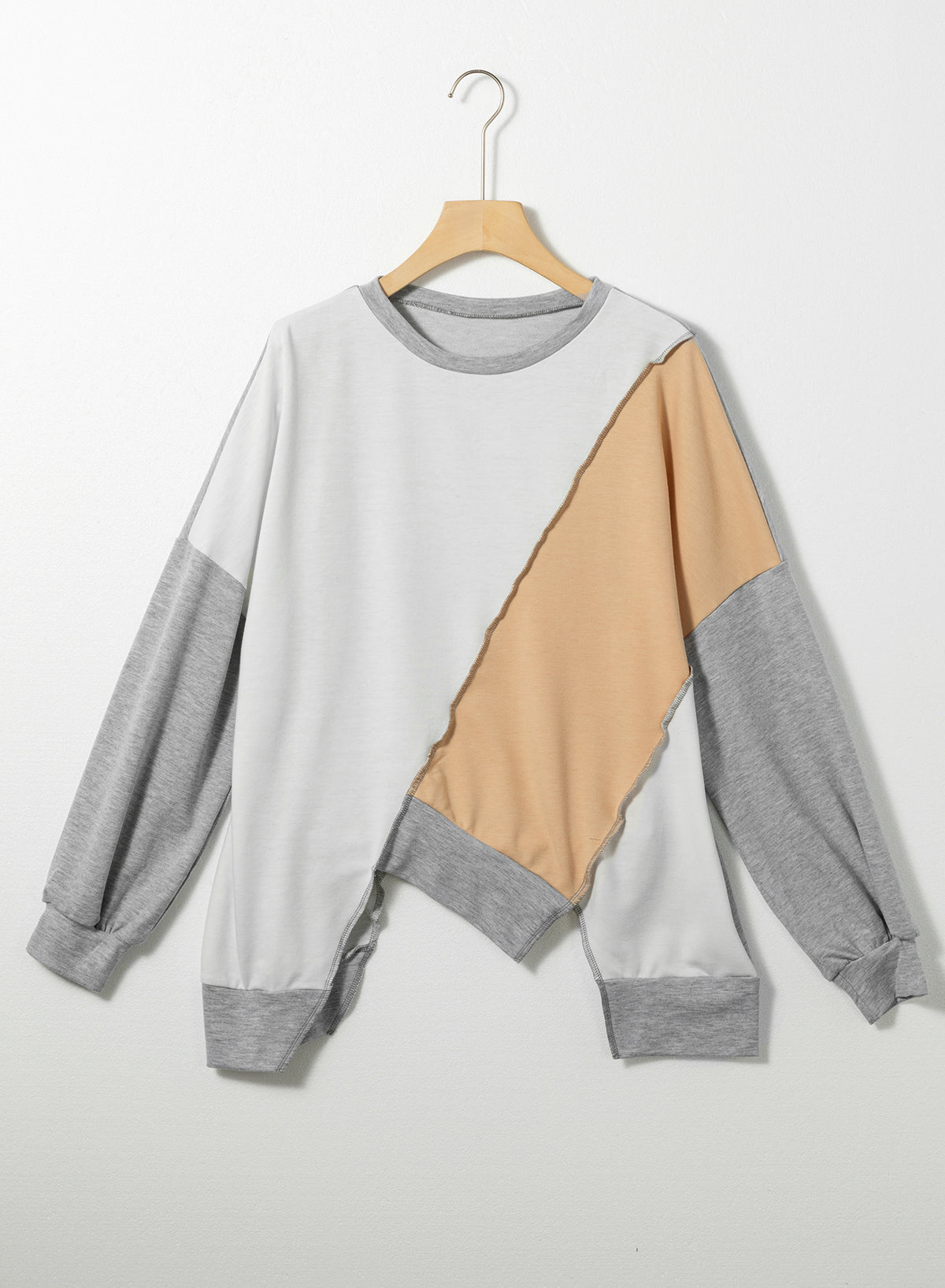 Licht Frans beige colorblock stiksel, onregelmatige zoom, top met lange mouwen