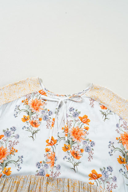 Witte plus-size blouse met bloemenprint, V-hals en pofmouwen