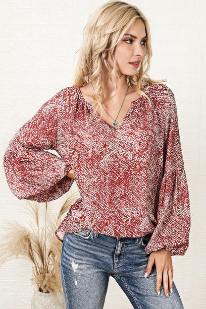 Vurige rode geplooide blouse met abstracte print en lantaarnmouwen