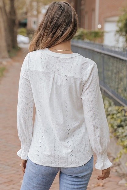 Witte losse blouse met splithals en textuur