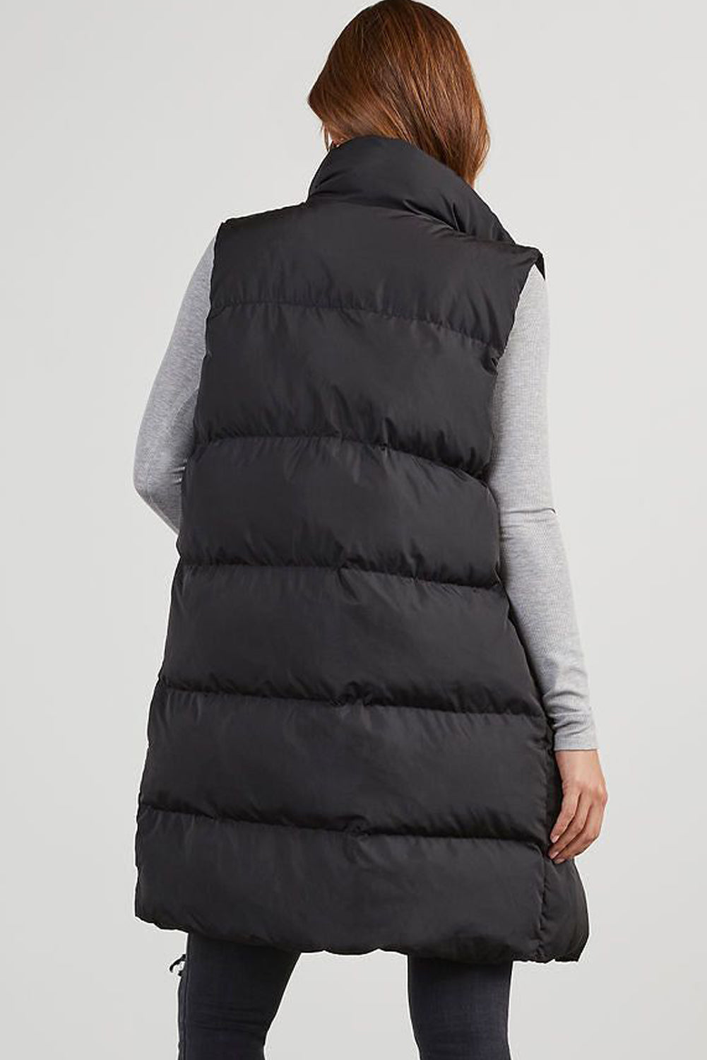 Zwarte winddichte longline Volledige zipper -puffervest met zakken