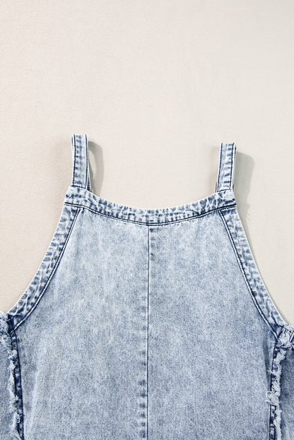 Beau Blue Light Wash Gerafelde denim overall met zichtbare naden en wijde pijpen