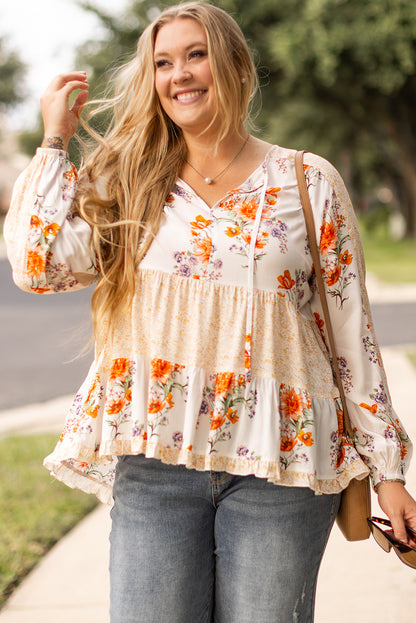 Witte plus-size blouse met bloemenprint, V-hals en pofmouwen