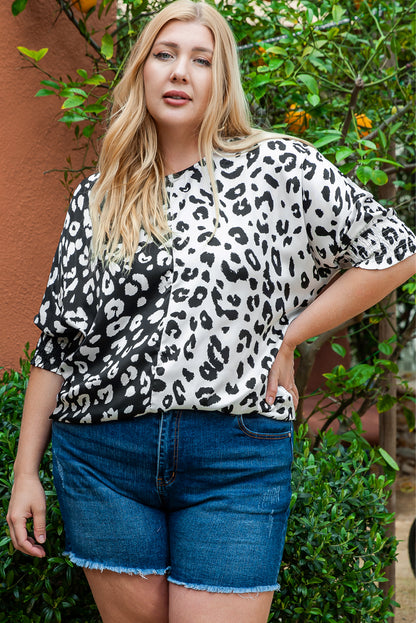 Zwarte grote maat blouse met luipaardprint en halve mouwen