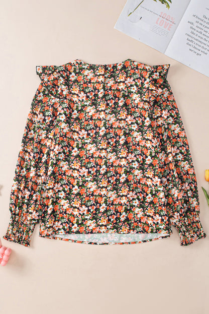 Oranje blouse met ruches, gesmokte manchetten en bloemen