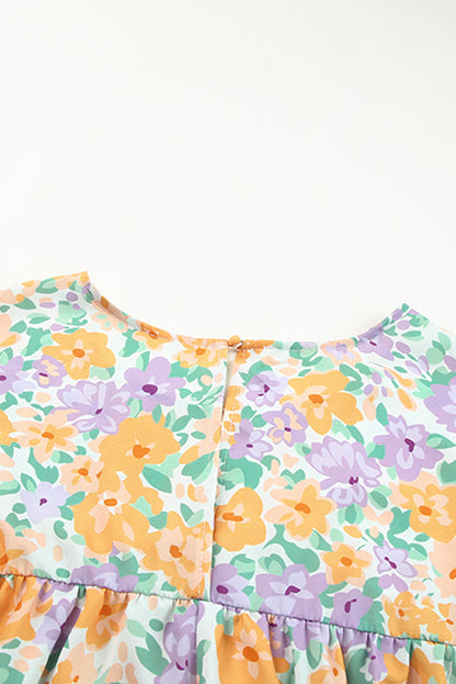 Babydollblouse met gele bloemenprint en keyhole-achterkant met korte mouwen