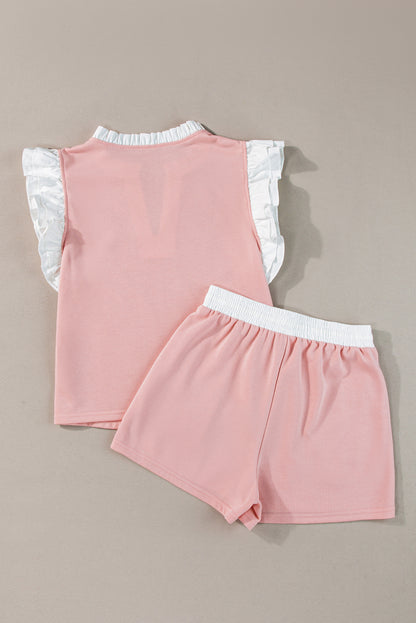 Lichtroze set met gegolfde top en short met contrasterende rand