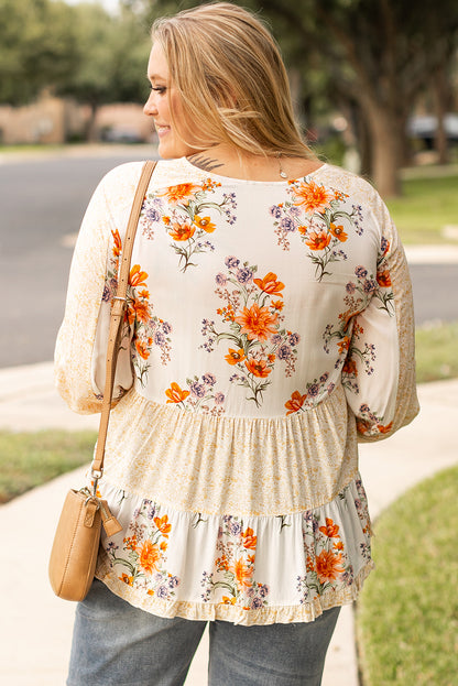 Witte plus-size blouse met bloemenprint, V-hals en pofmouwen