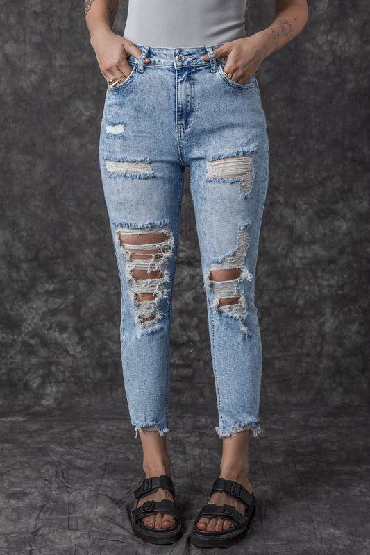 Hemelsblauwe acid wash noodlijdende slim-fit jeans